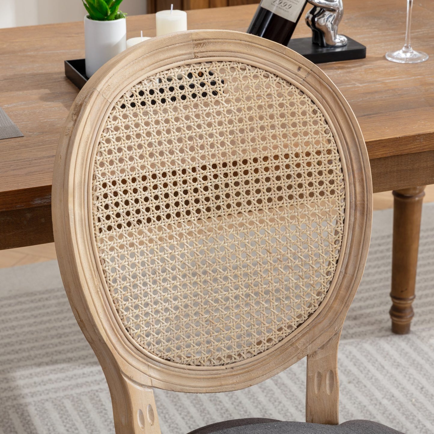 Oval cane back dining chair with distressed wood frame