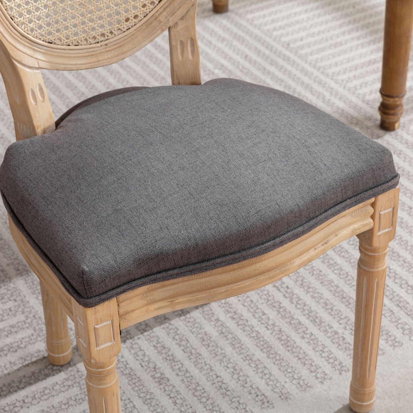 French provincial dining chair with grey upholstered seat and cane back