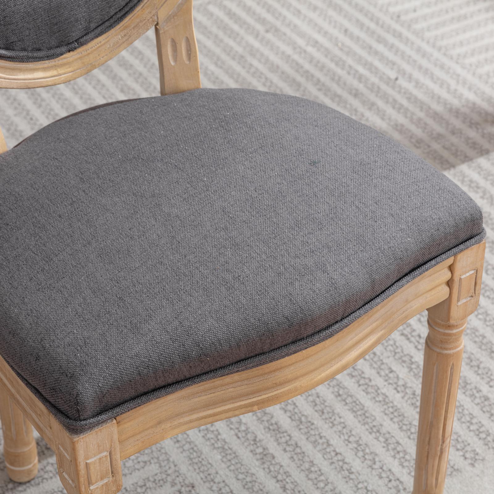 French country dining chair with grey upholstered seat and light wood frame