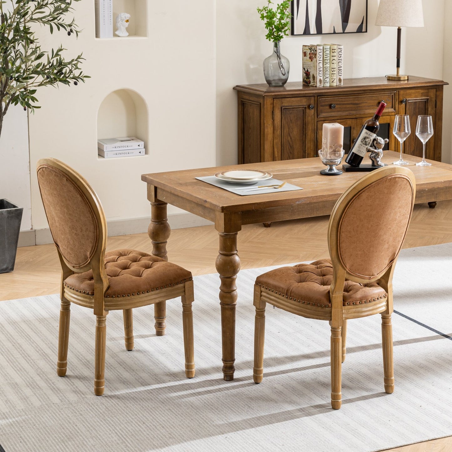 Tufted brown upholstered dining chair with distressed wood frame