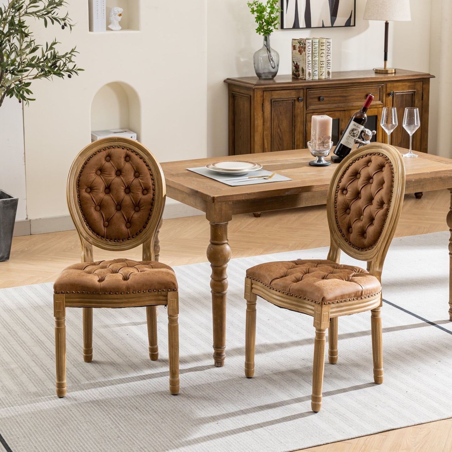Tufted brown leather dining chair with ornate wooden frame
