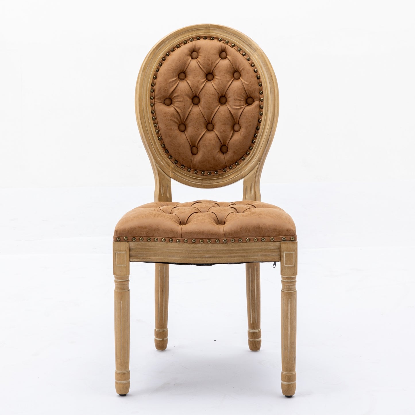 Tan leather tufted accent chair with distressed wood frame