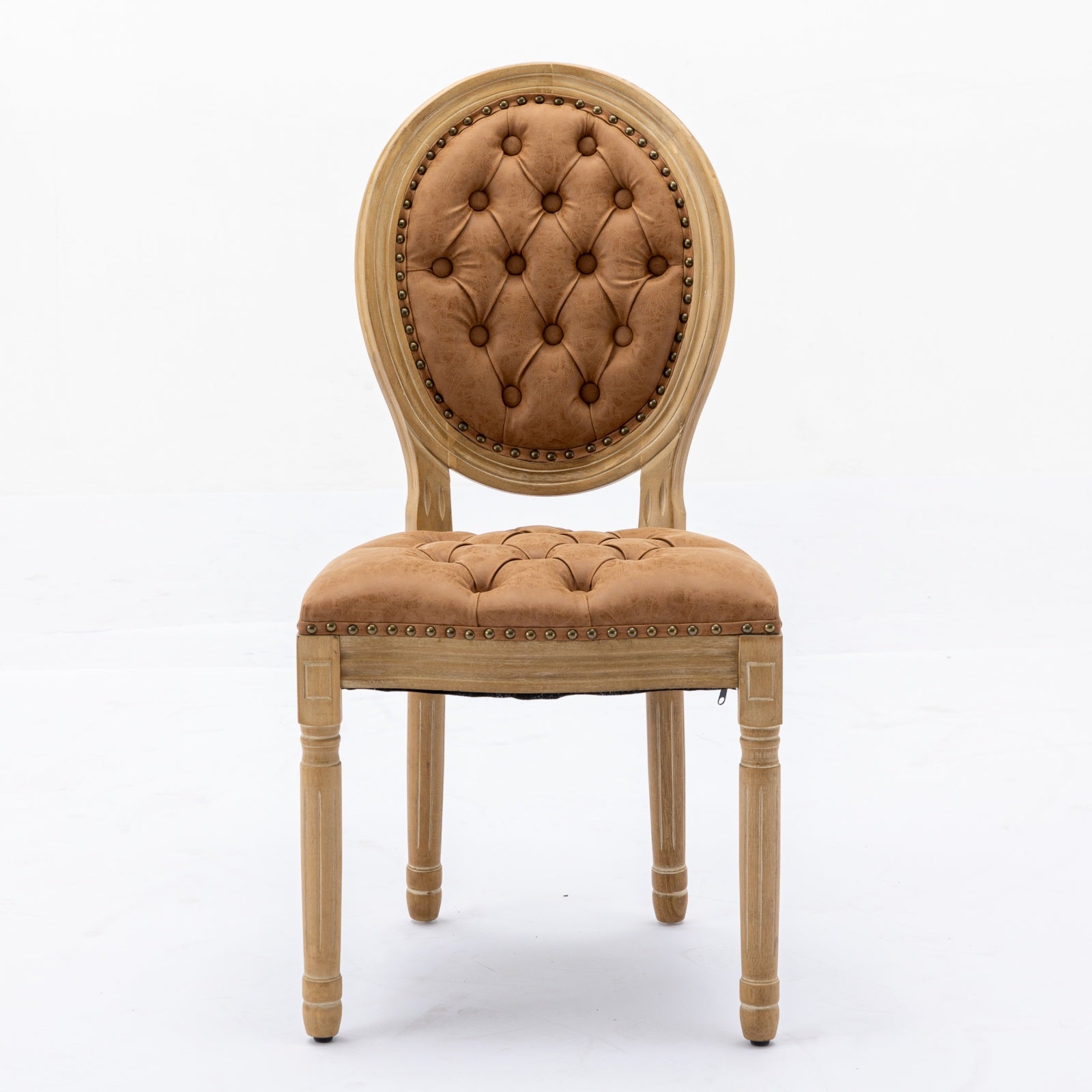 Tan leather tufted accent chair with distressed wood frame