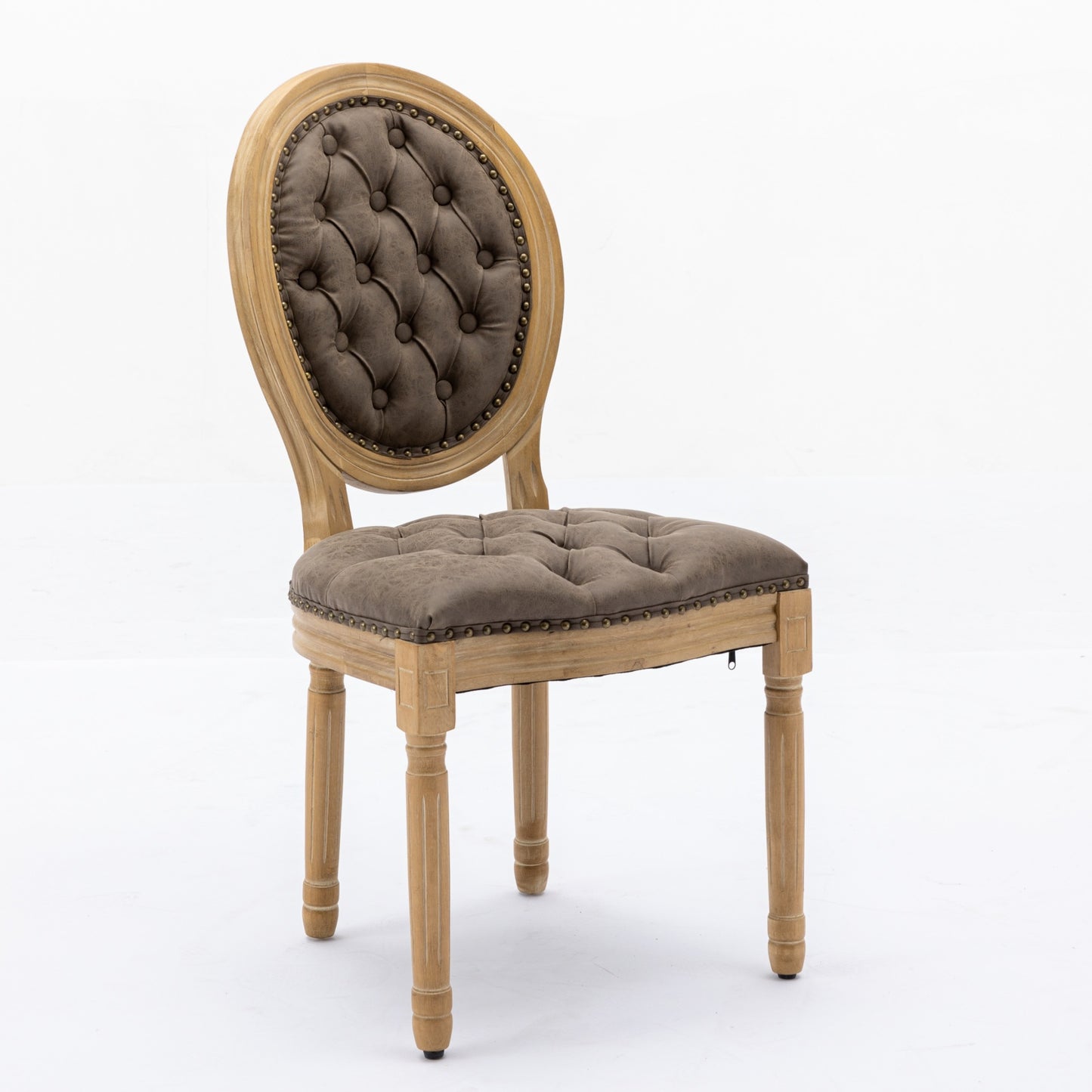 Elegant tufted brown upholstered accent chair with distressed wood frame and brass nailhead trim