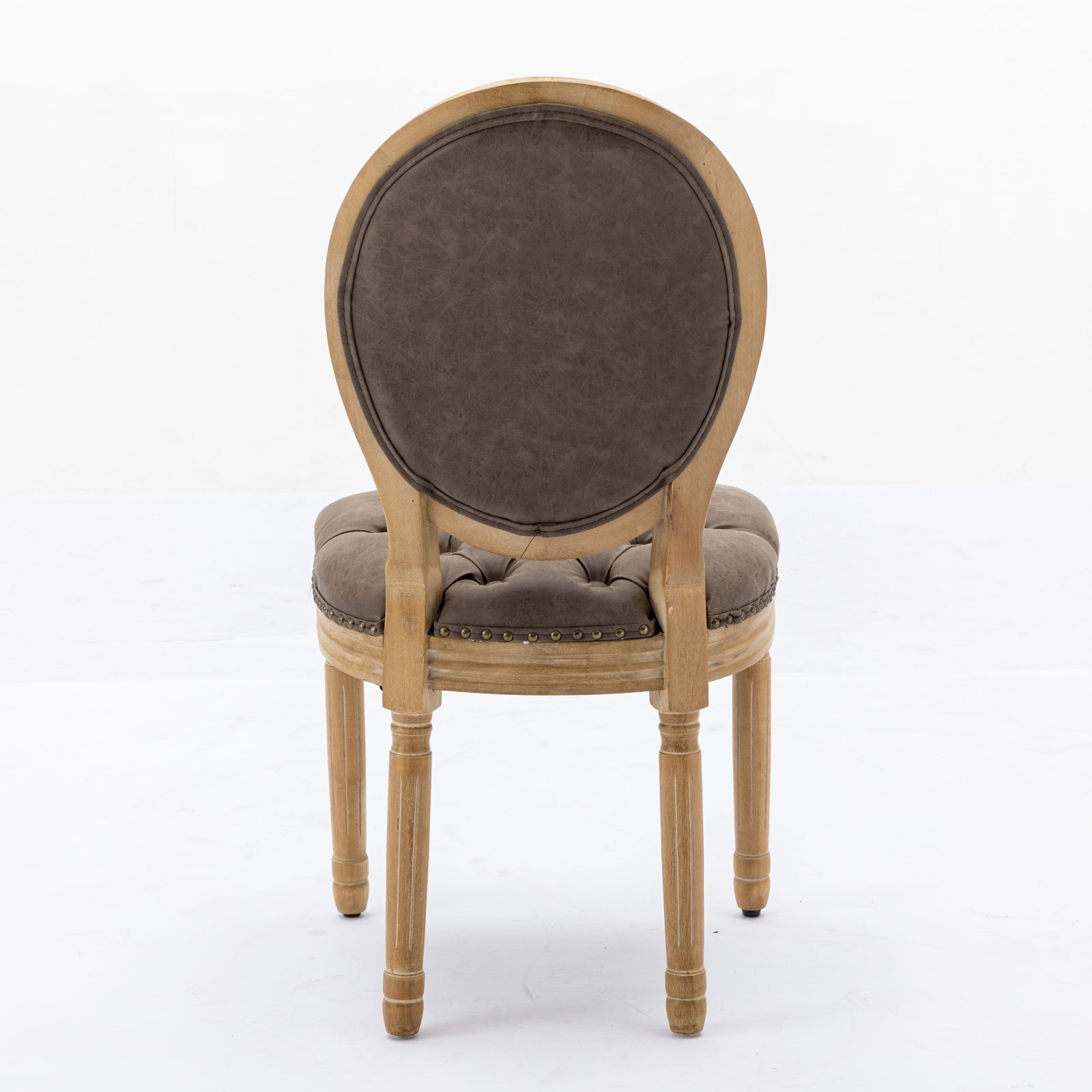 Vintage oak and distressed brown leather accent chair with brass nailhead trim