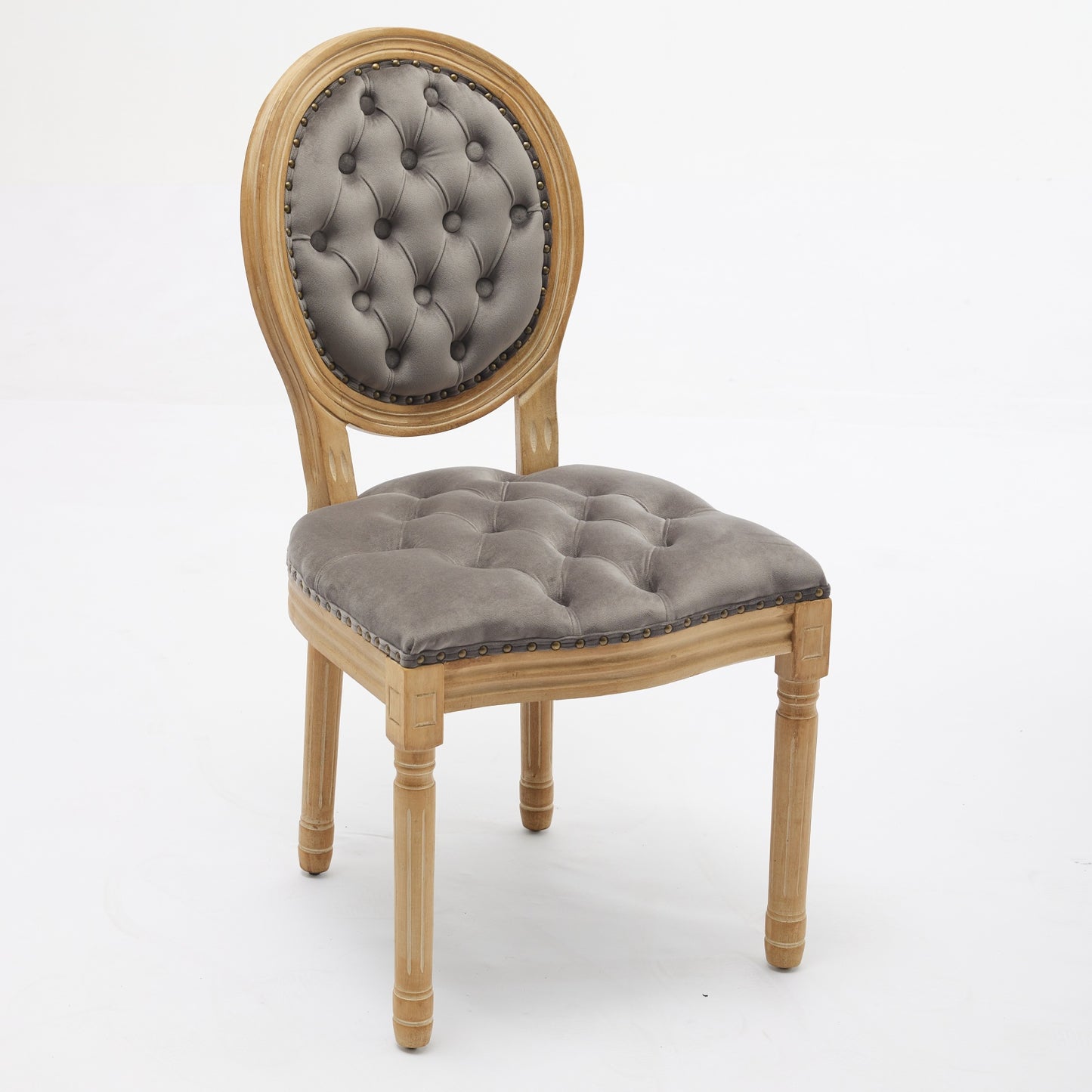 Grey velvet tufted dining chair with distressed wood frame