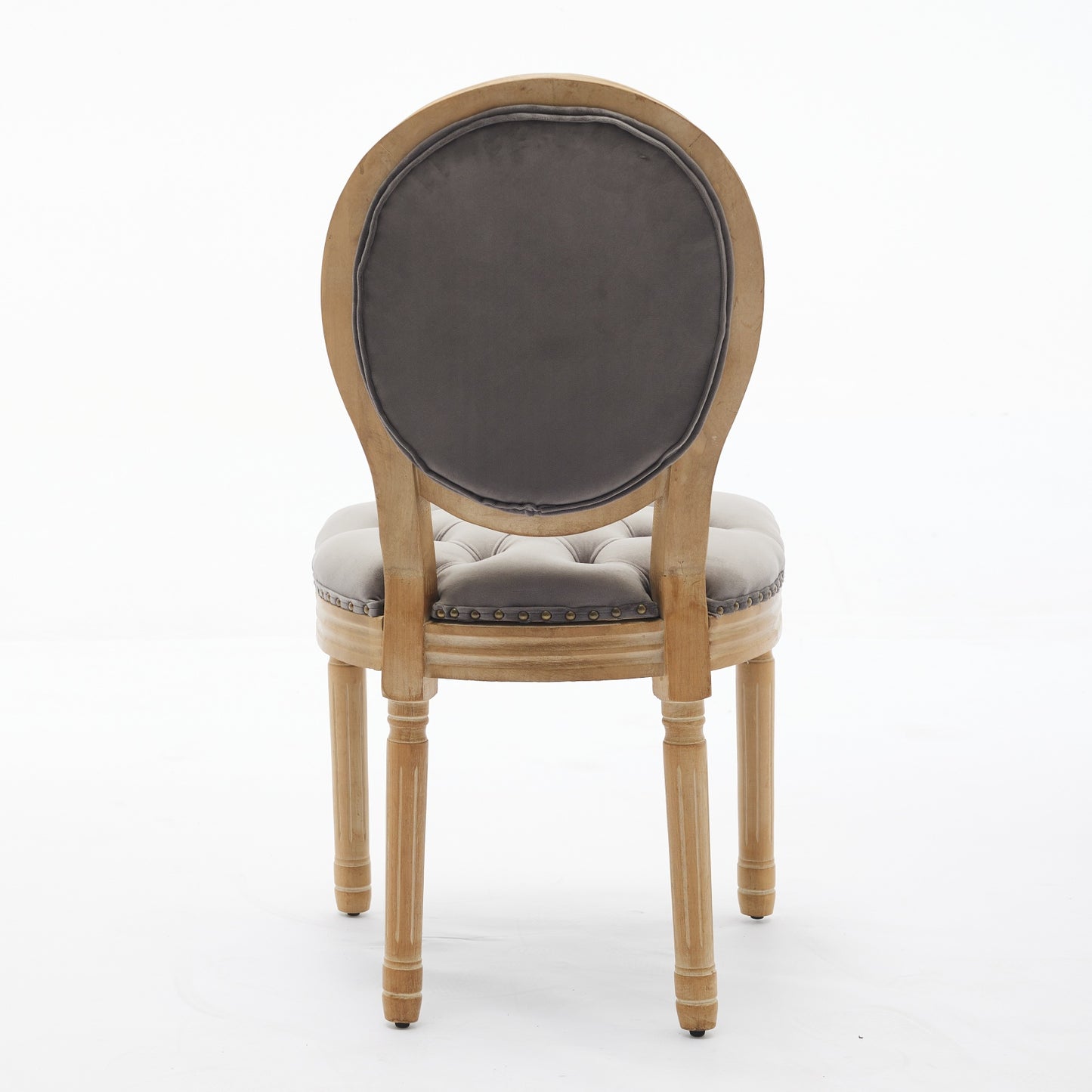 Grey velvet tufted dining chair with distressed wood frame