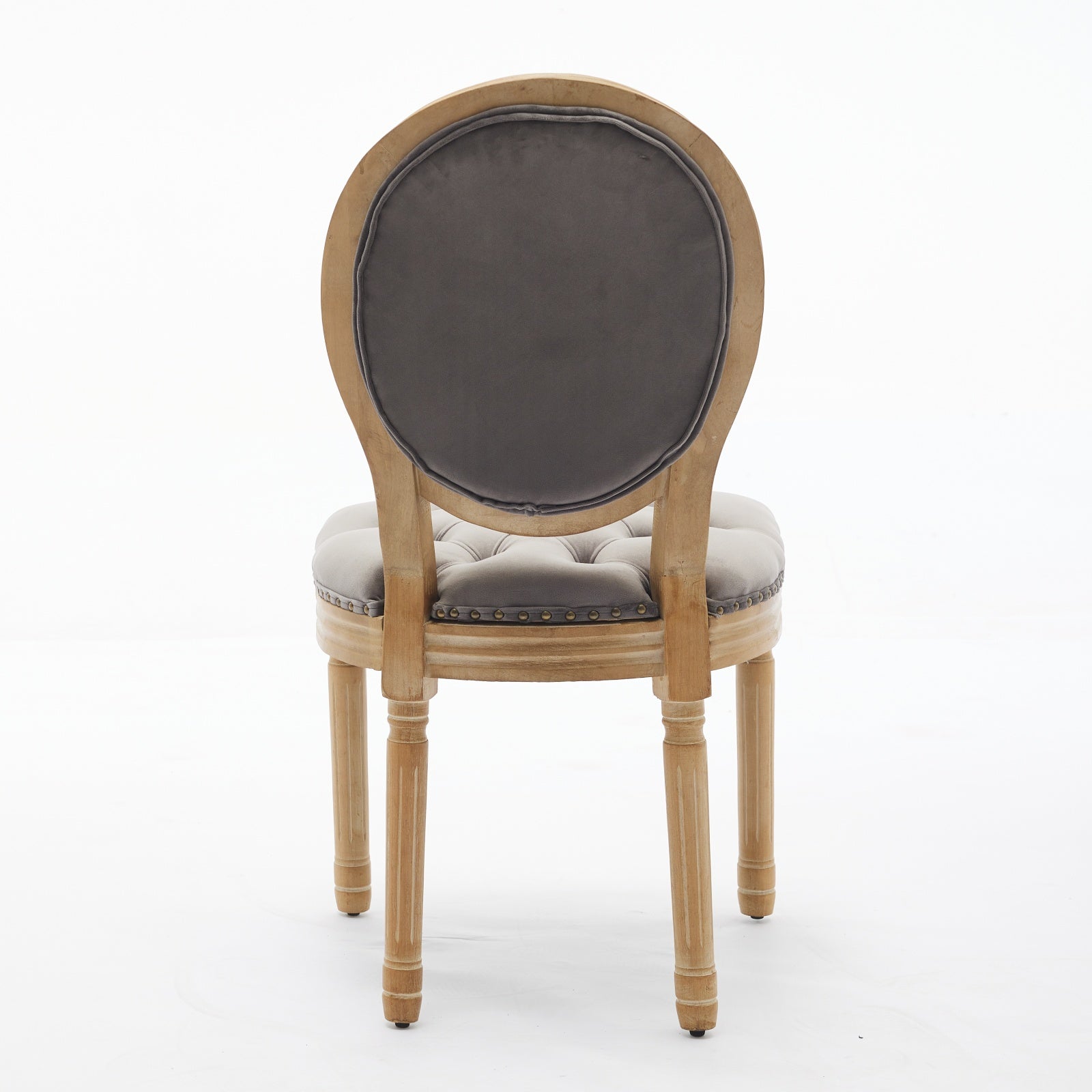Grey velvet tufted dining chair with distressed wood frame