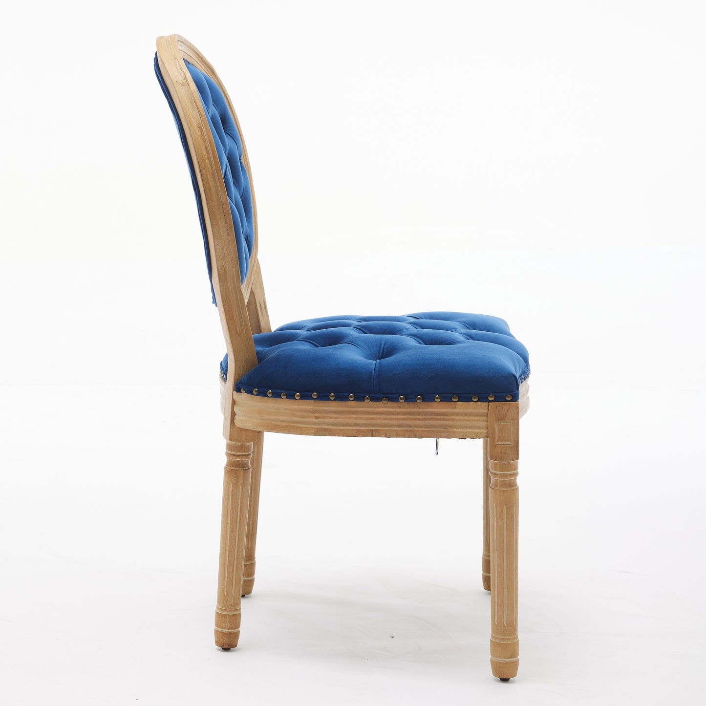 Blue velvet tufted dining chair with distressed wood frame