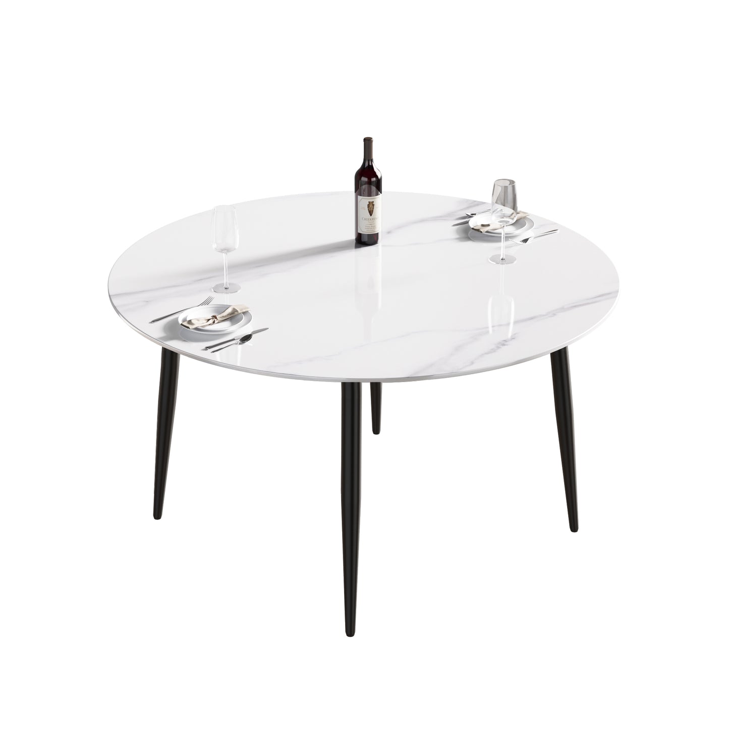 White marble round dining table with black tapered legs and place settings for two