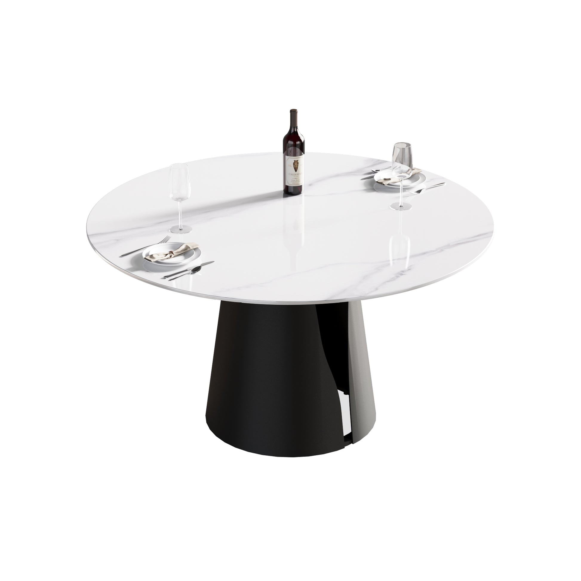 Round marble dining table with black pedestal base and place settings