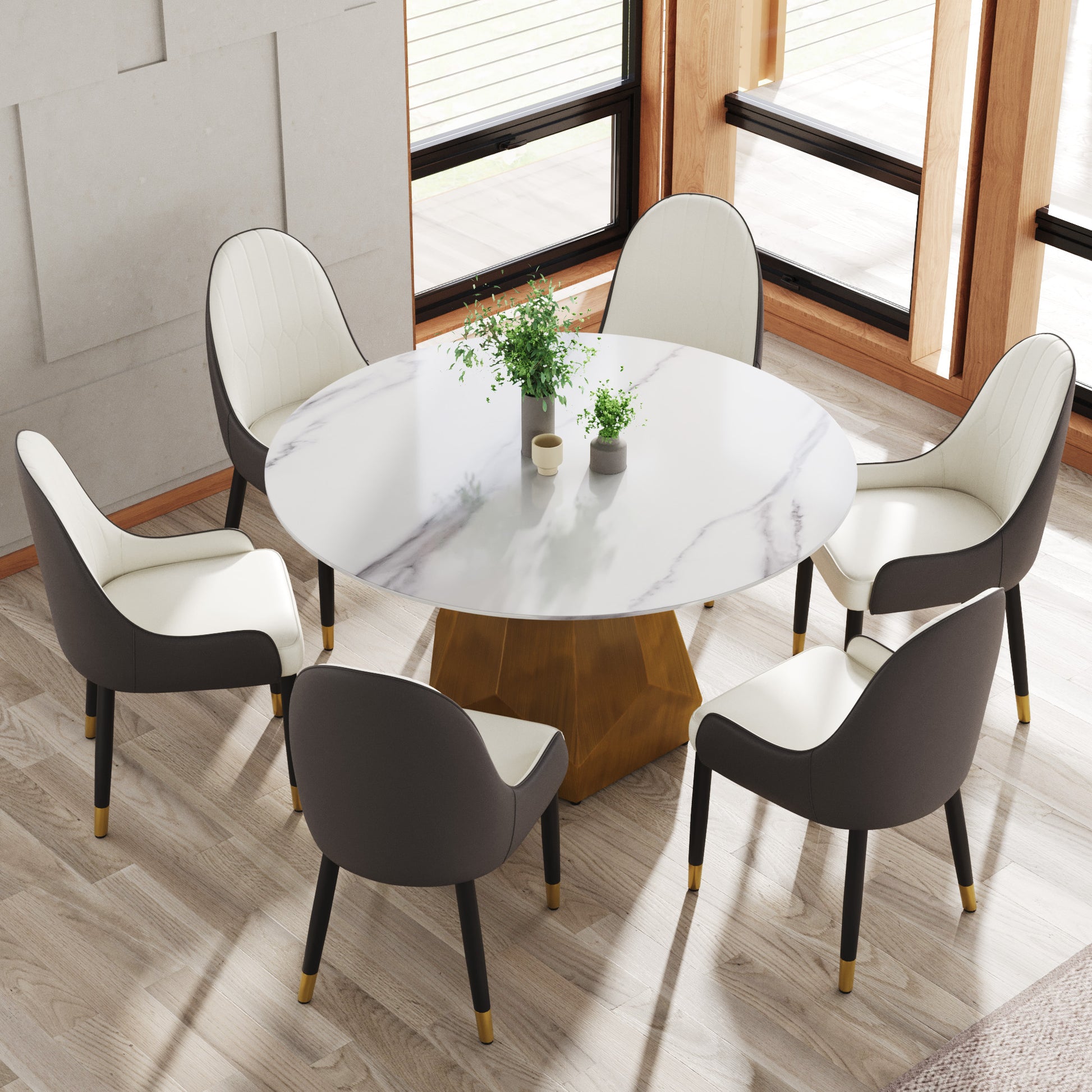 White marble round dining table with gold geometric base