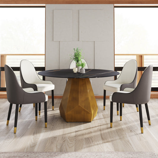 Black marble dining table with geometric gold base and whitegrey upholstered chairs