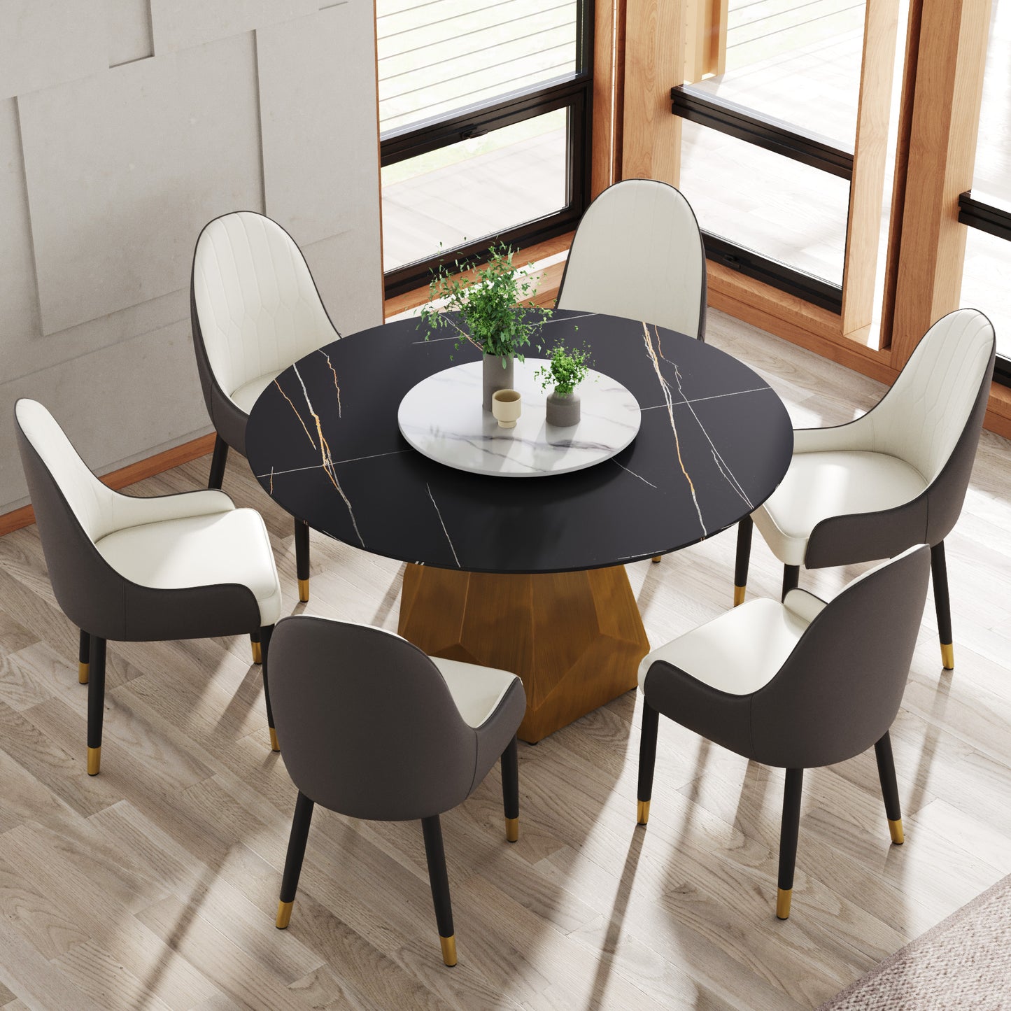 Black marble dining table with gold pedestal and cream upholstered chairs