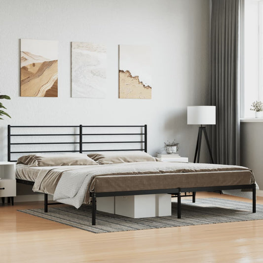 Black metal bed frame with minimalist headboard and grey patterned bedding