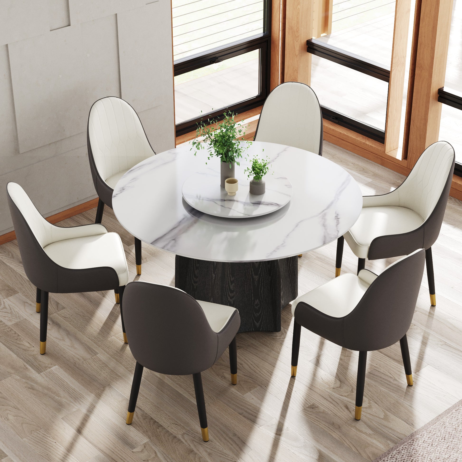 Round marble dining table with grey and white chairs