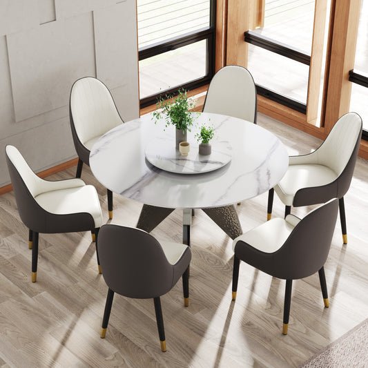 Round marble dining table with six upholstered chairs
