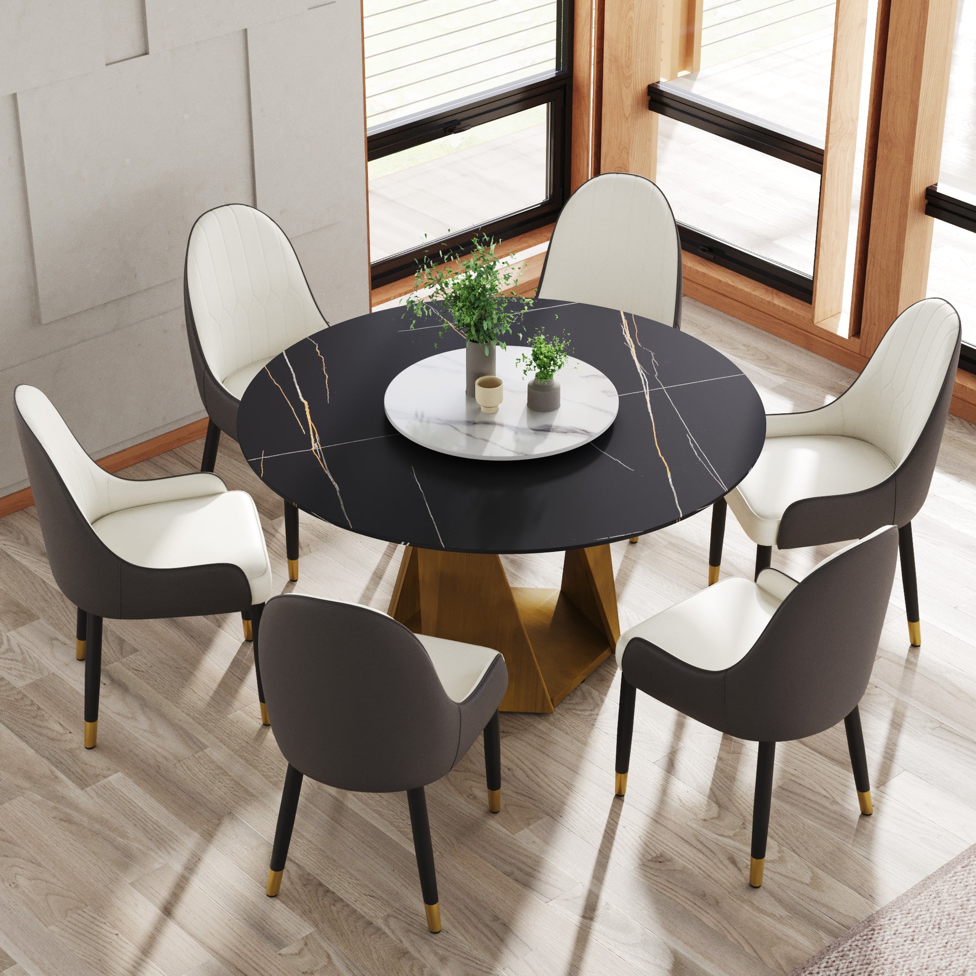 Round faux marble dining table with brass base and upholstered chairs