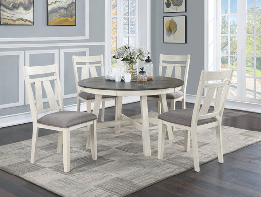 Round dining table set with four creamcolored chairs featuring gray upholstered seats