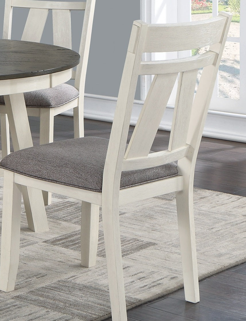 Cream distressed dining chair with upholstered grey seat