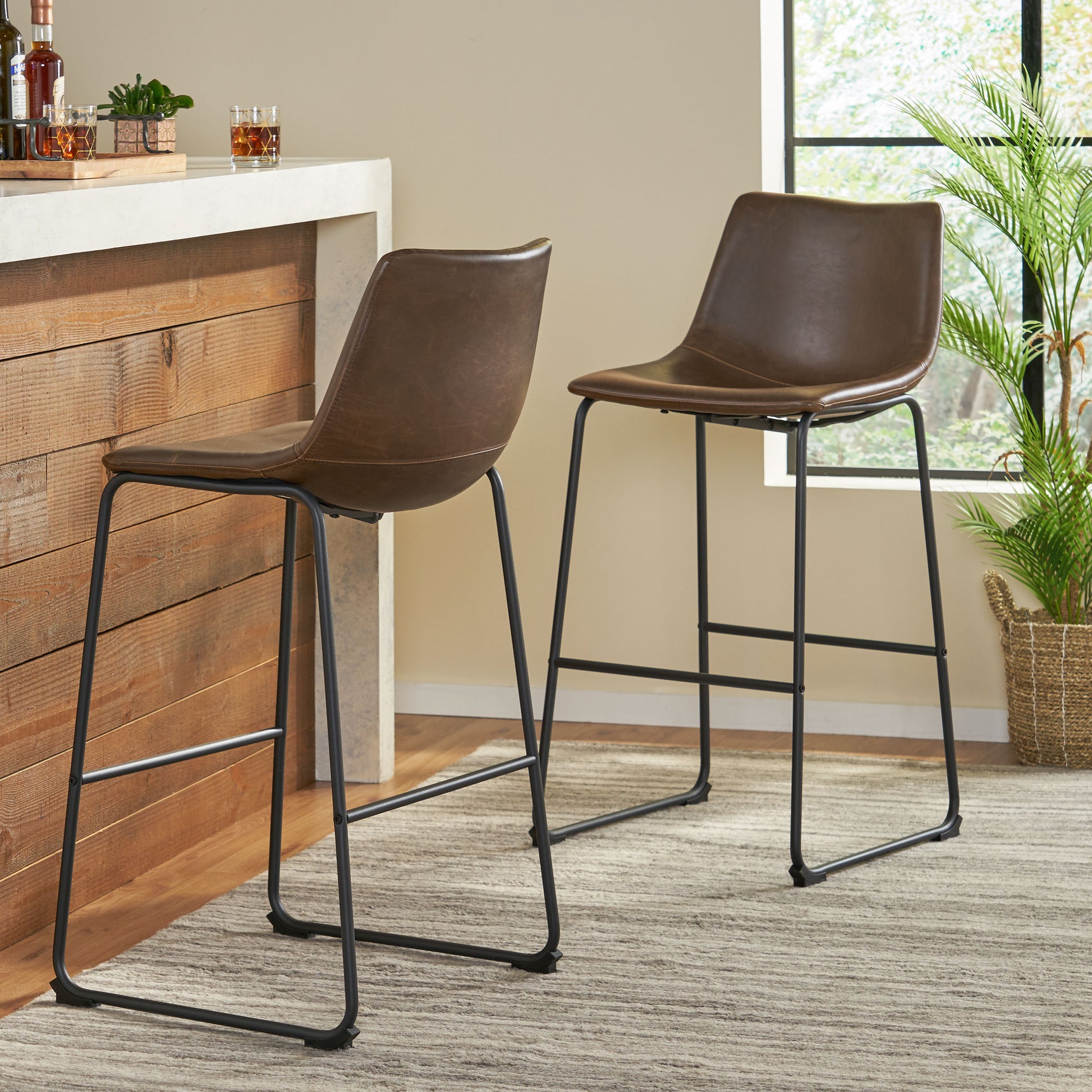 Brown vegan leather bar stool with black metal legs and lumbar support