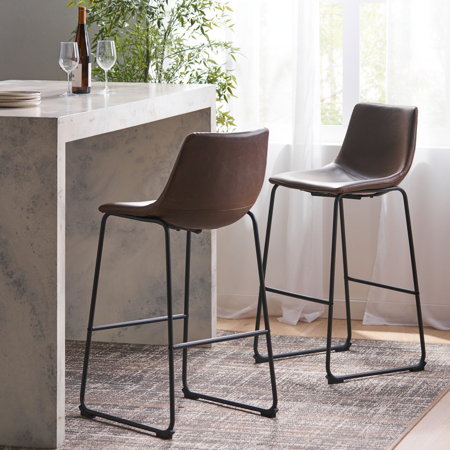 Brown faux leather bar stool with black metal legs
