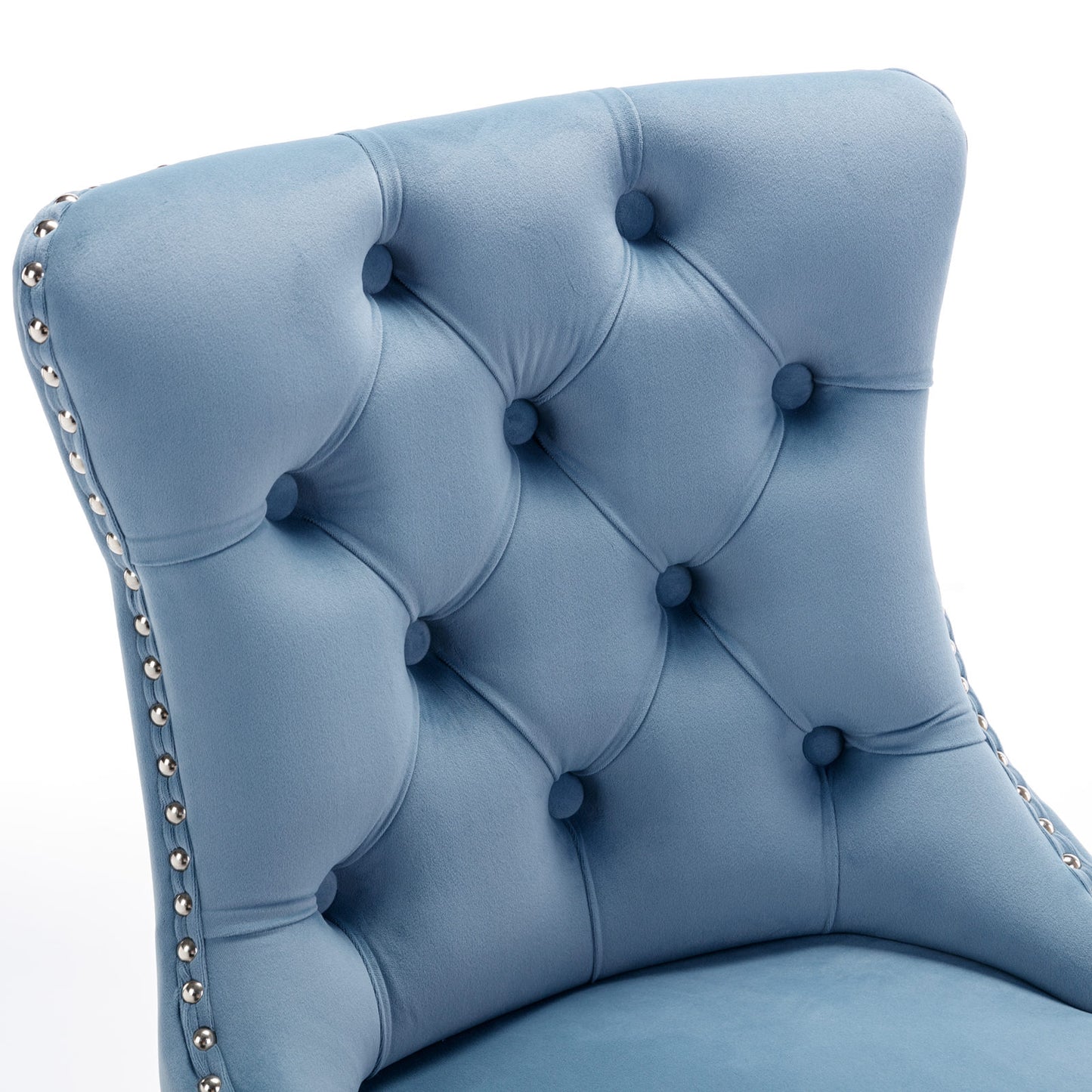 Tufted blue velvet bar stool with silver nailhead trim detailing