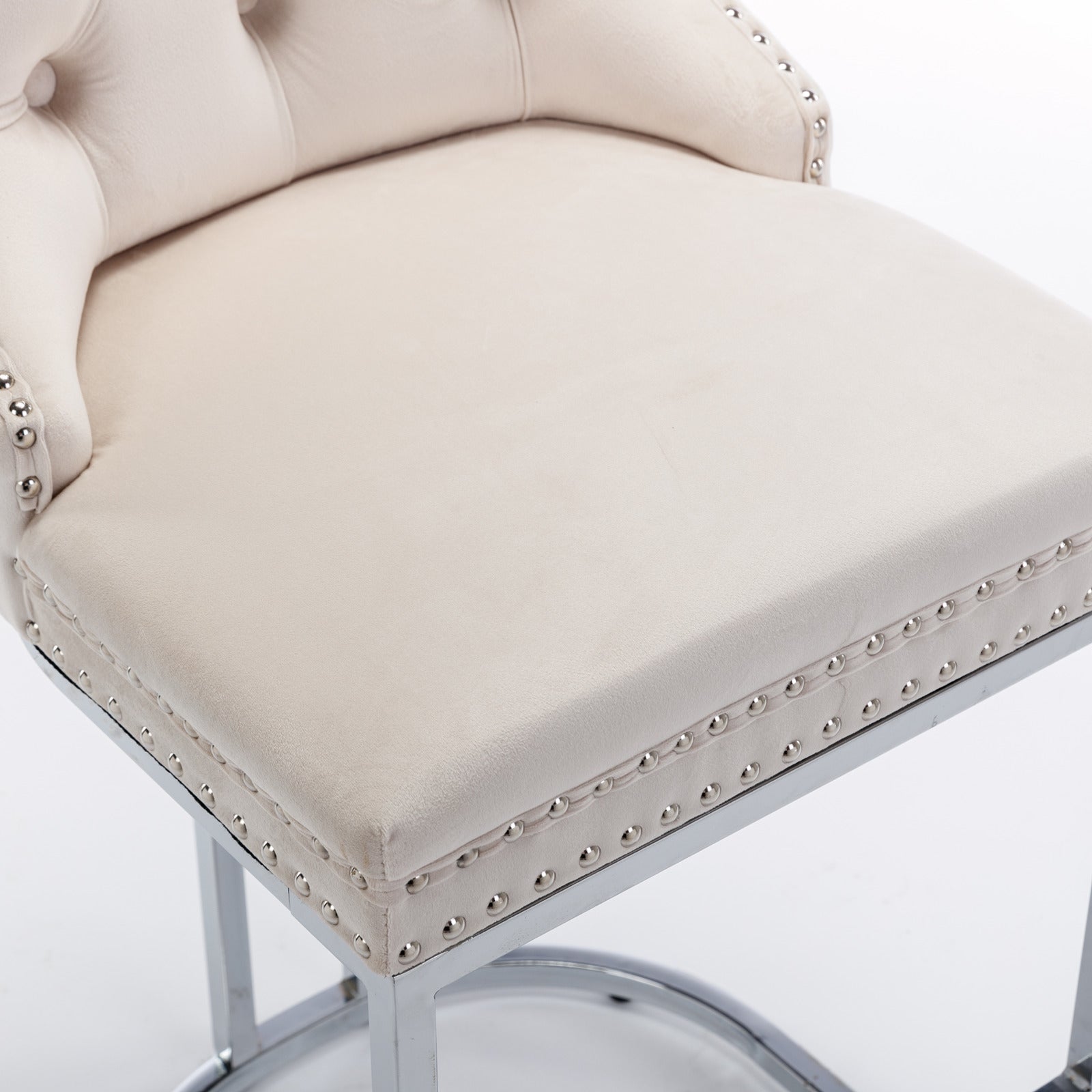 Cream velvet bar stool with tufted back and silver nailhead trim
