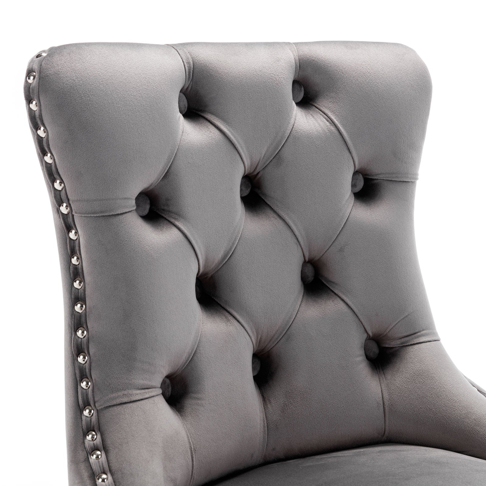 Grey velvet tufted armchair with silver nailhead trim detail