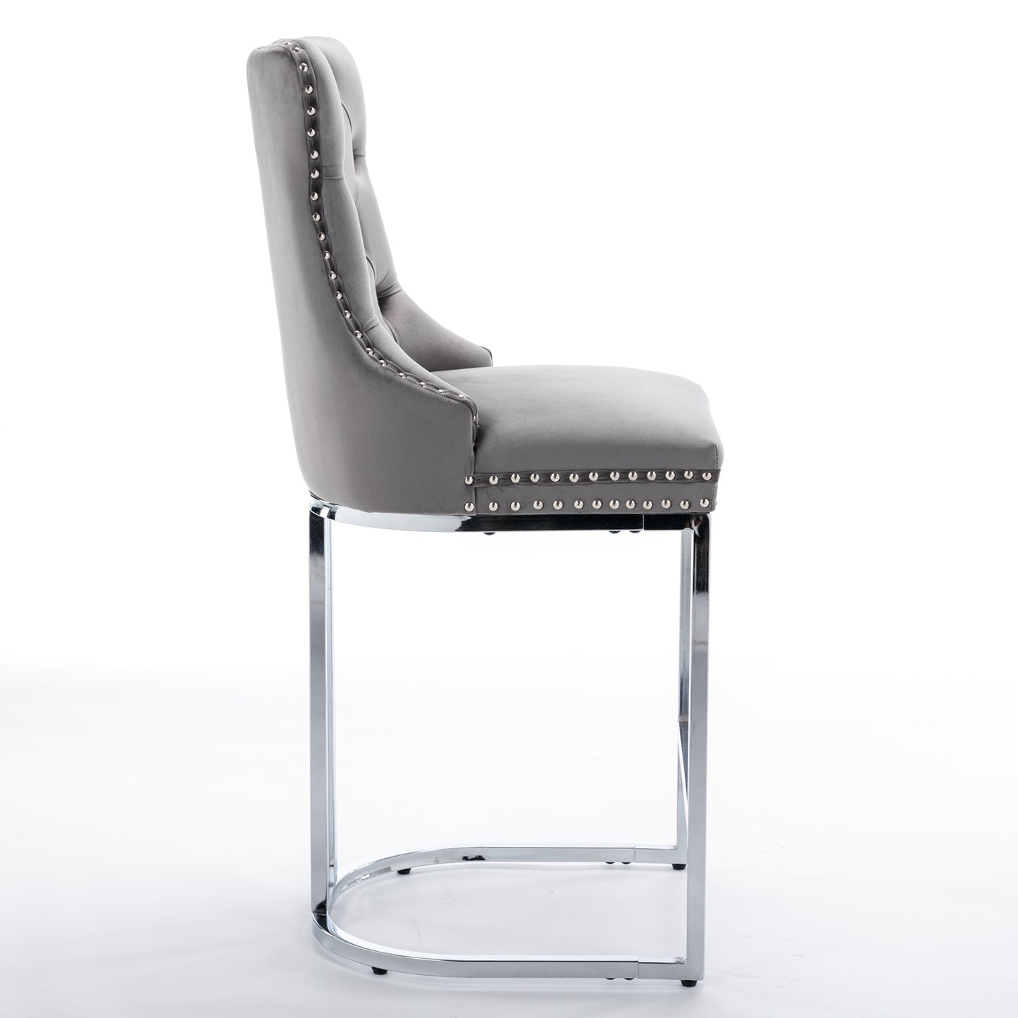 Grey velvet tufted bar stool with silver nailhead trim and chrome base