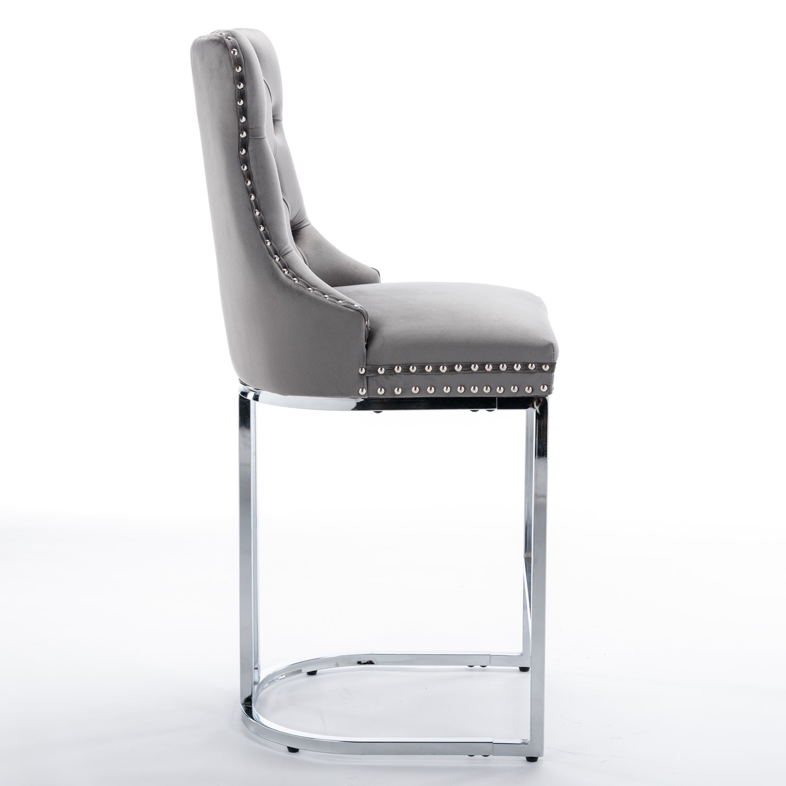 Grey velvet tufted bar stool with silver nailhead trim and chrome base