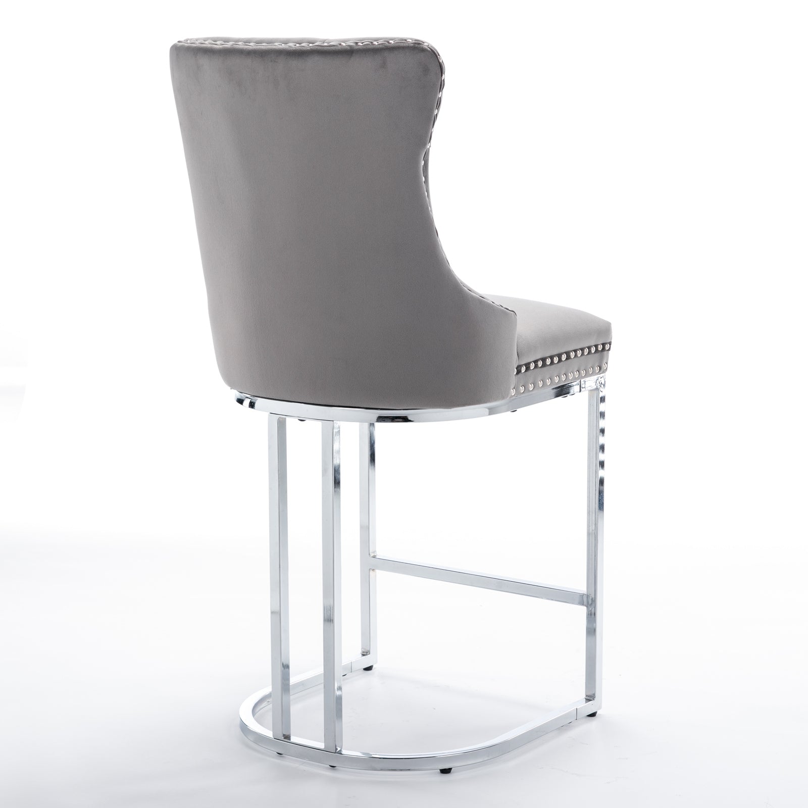 Grey velvet bar stool with diamond tufting and silver nailhead trim