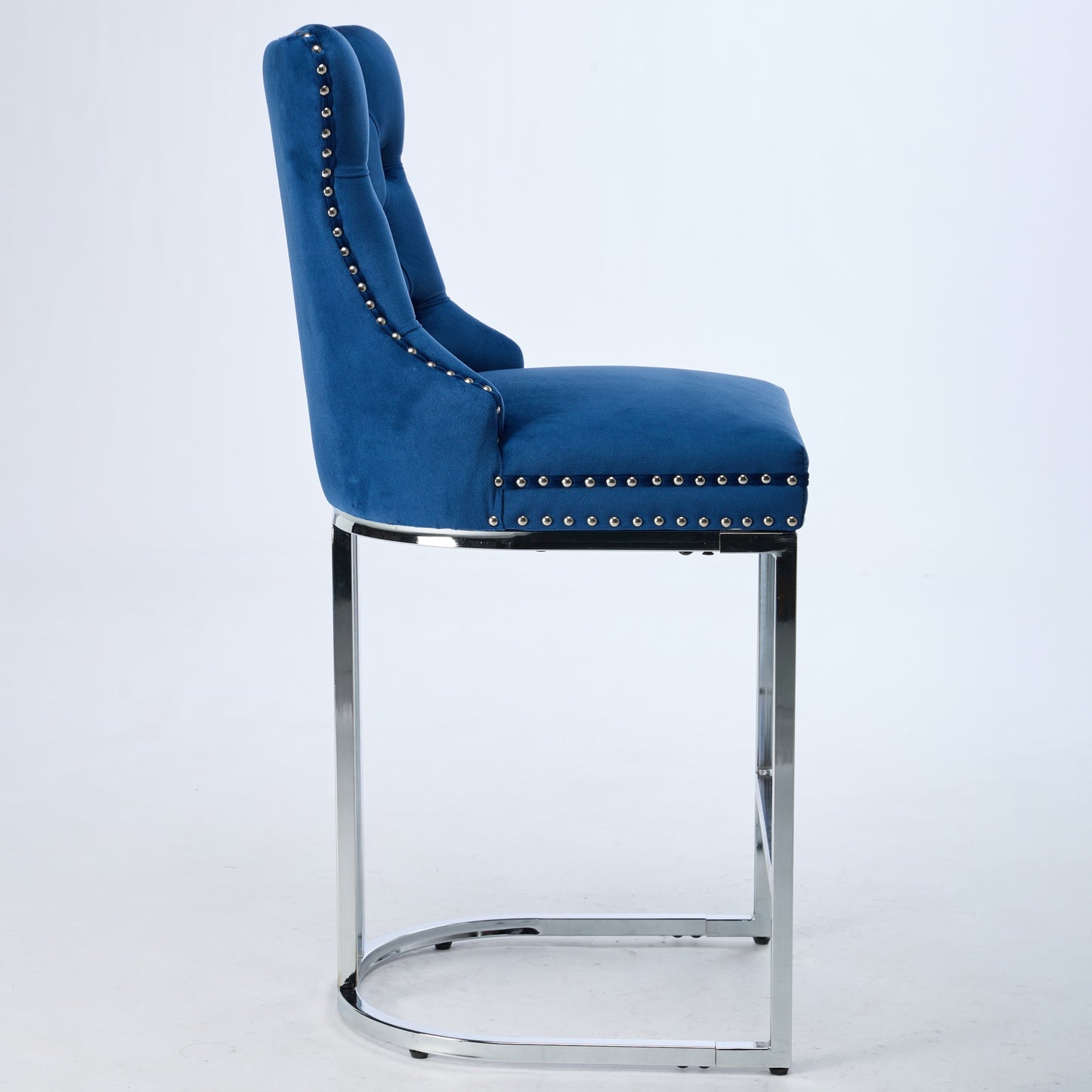 Deep blue velvet tufted bar stool with polished chrome legs