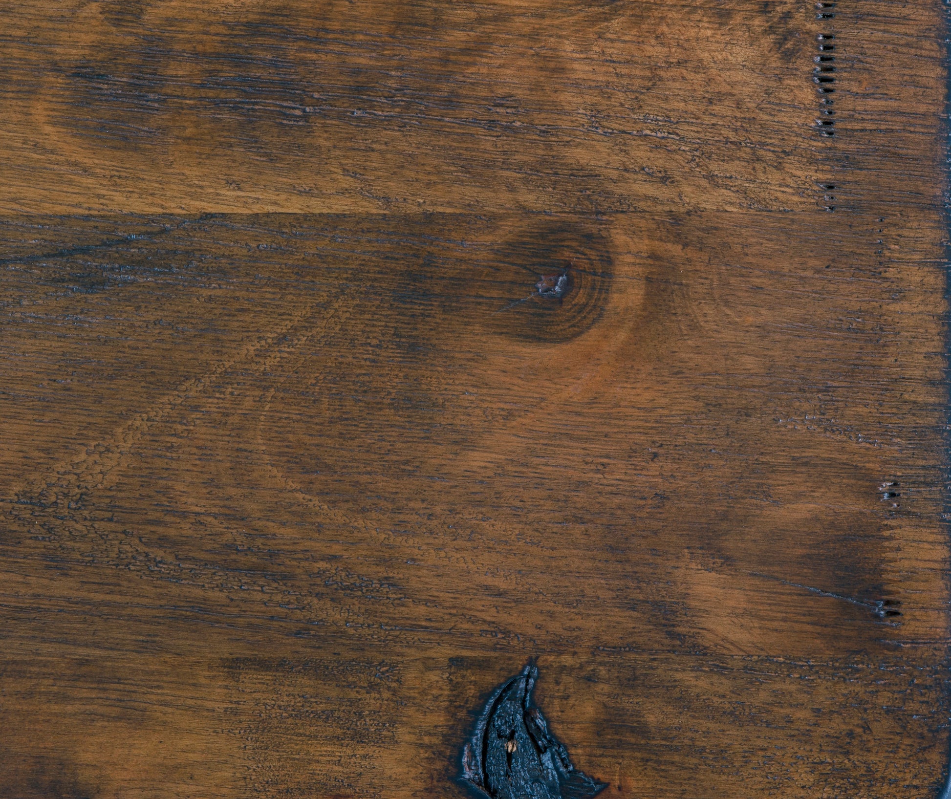 Dark stained oak wood texture with visible grain and knots