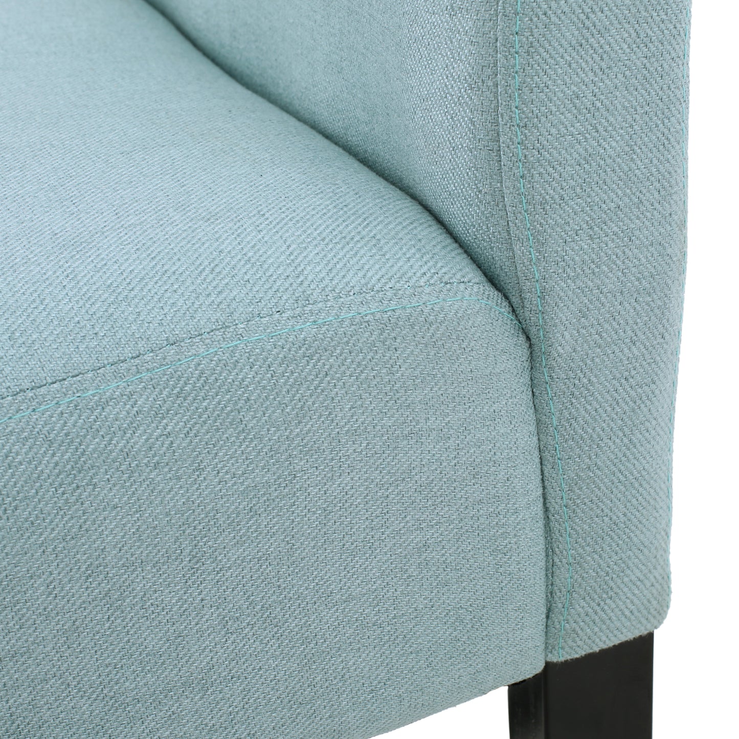 Closeup of textured blue fabric on a chair