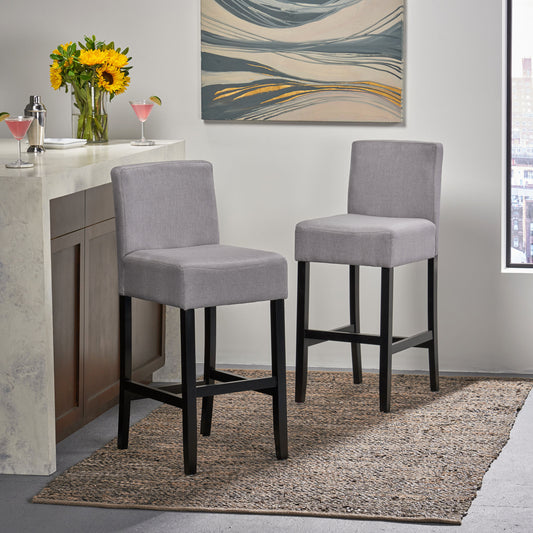 Grey upholstered bar stool with black legs