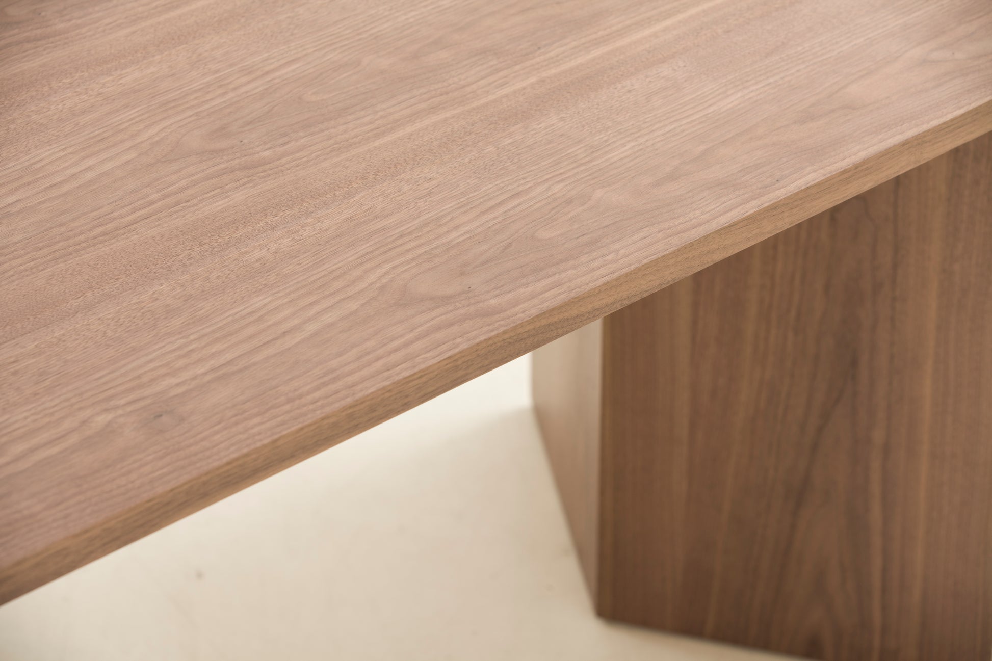 Walnut wood grain desk surface closeup