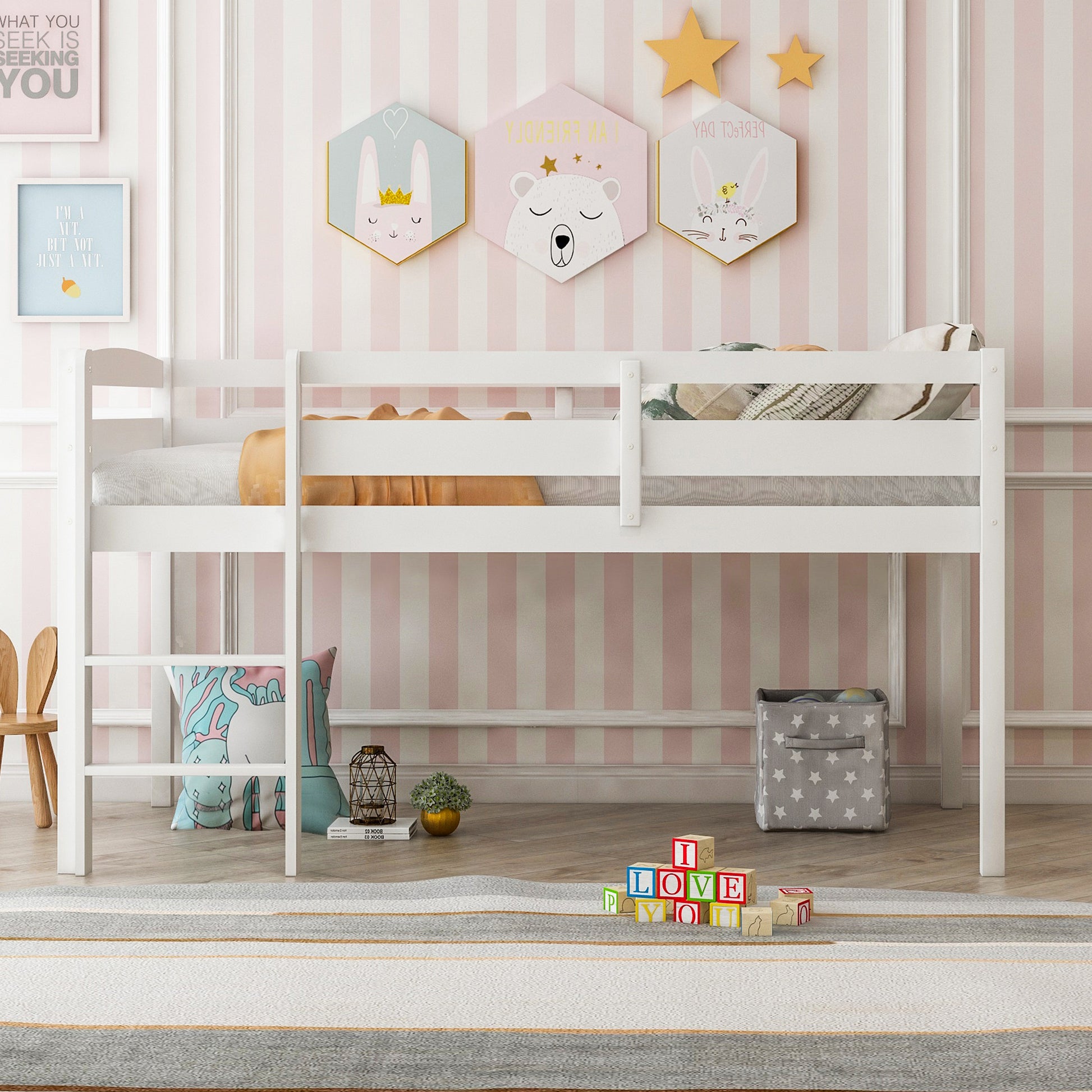 White wooden loft bed with ladder and bedding