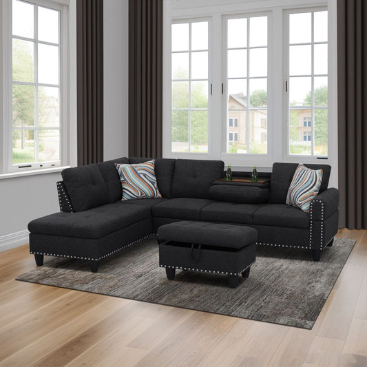 Dark gray sectional sofa with nailhead trim and striped throw pillows in living room