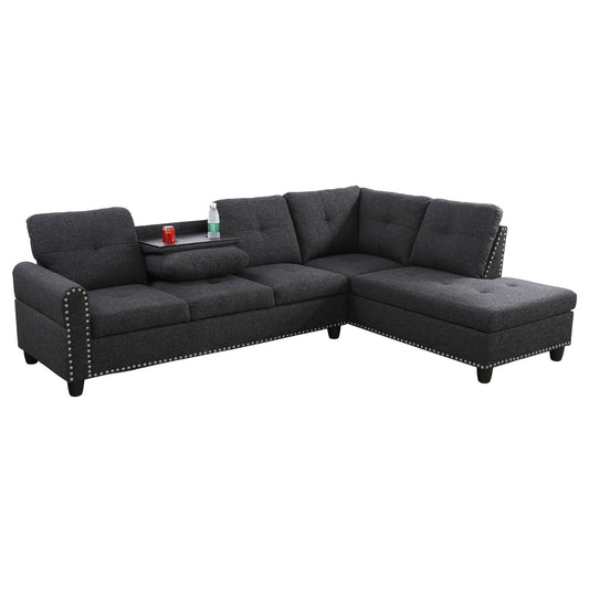 Dark gray tufted sectional sofa with nailhead trim for living room