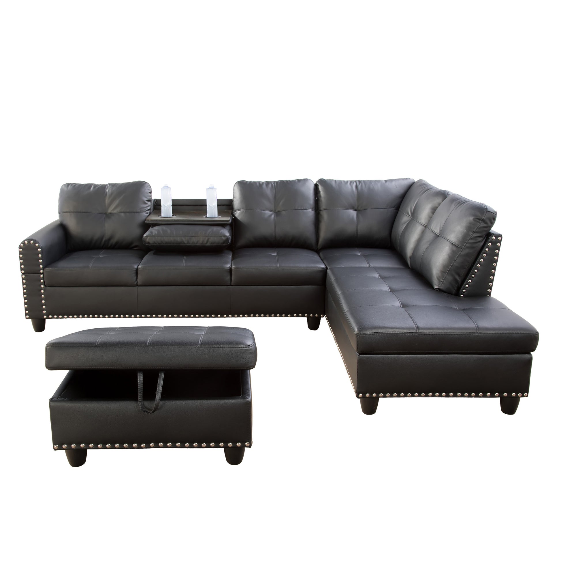 Black tufted leather sectional sofa with nailhead trim and storage ottoman