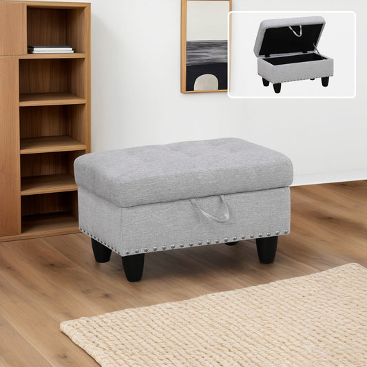 Gray fabric storage ottoman with hinged lid and nailhead trim for home decor