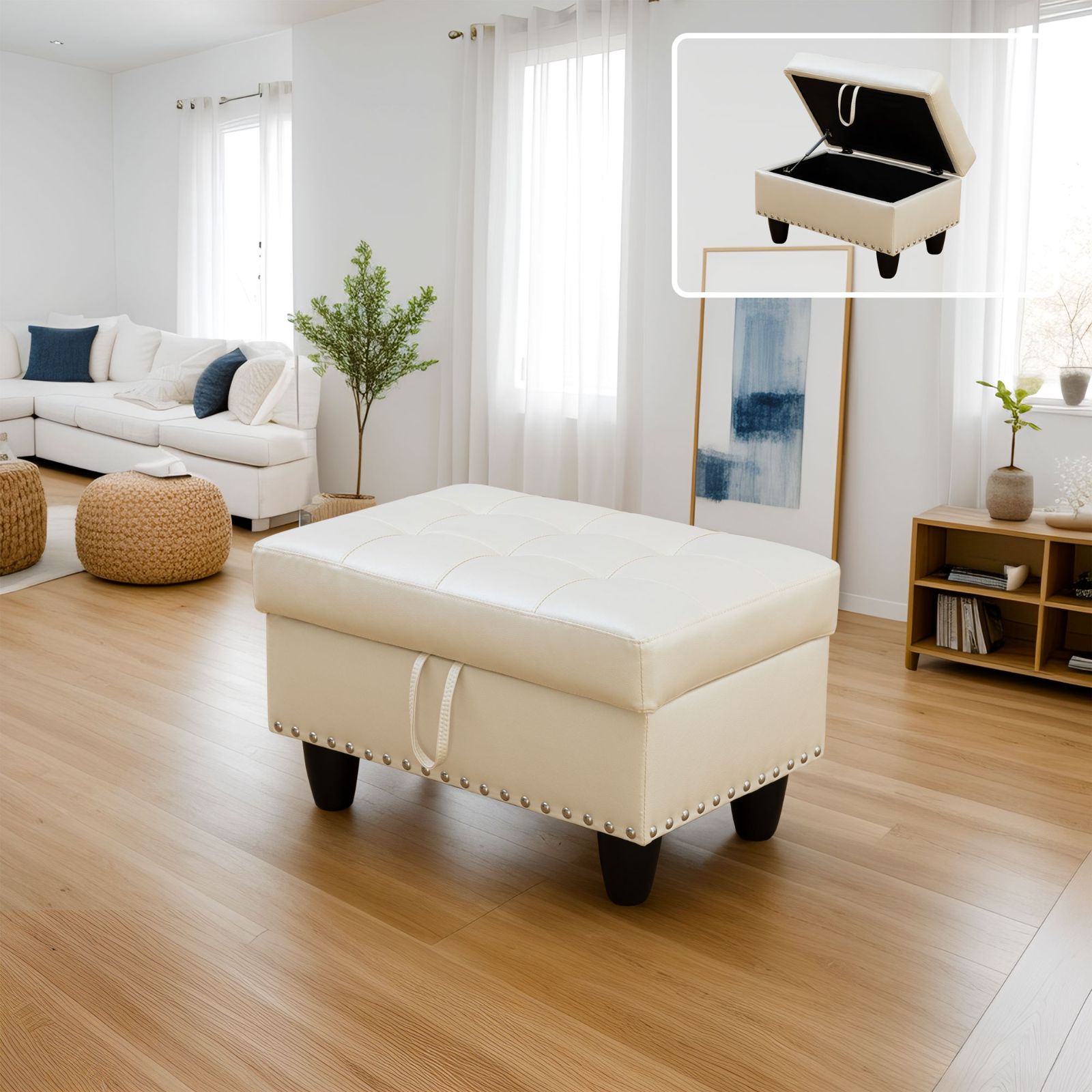 Cream tufted storage ottoman with silver nailhead trim and black tapered legs