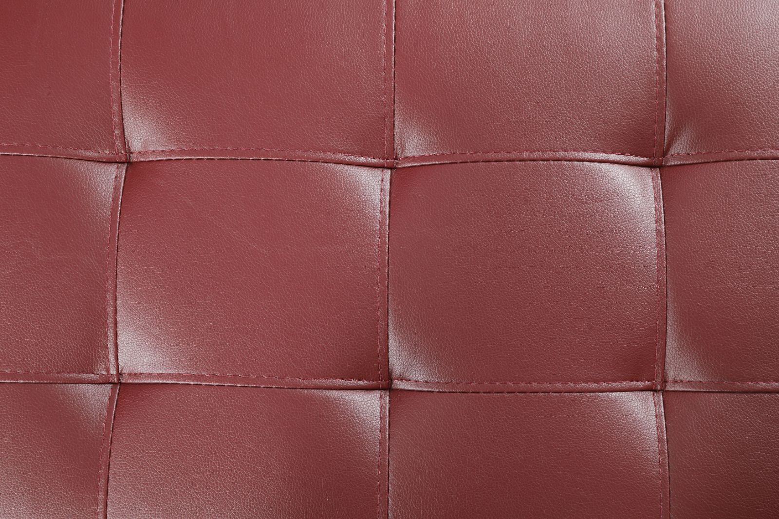 Deep burgundy quilted leather seat cushion with precise stitching