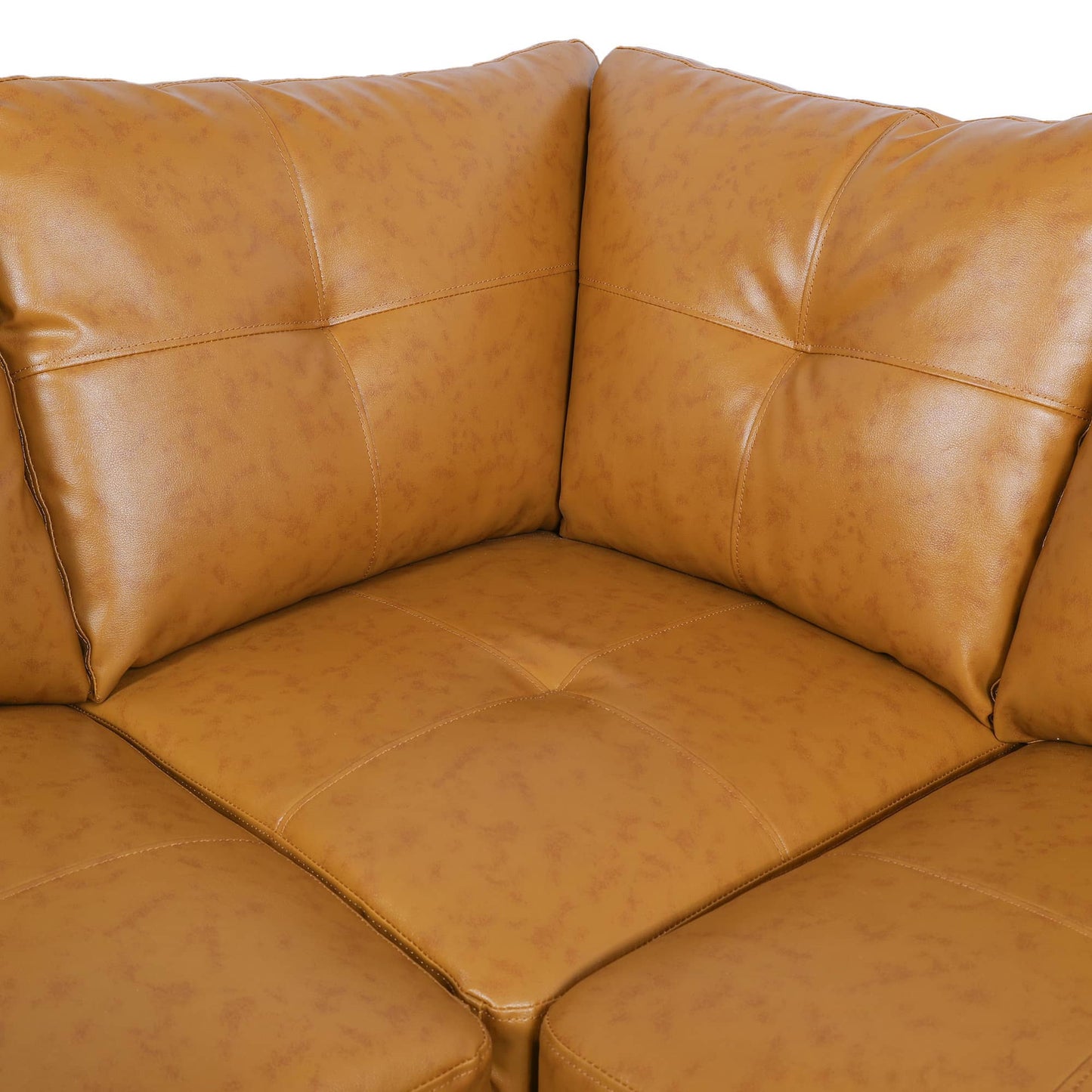 Tan leather sectional sofa with tufted cushions for living room