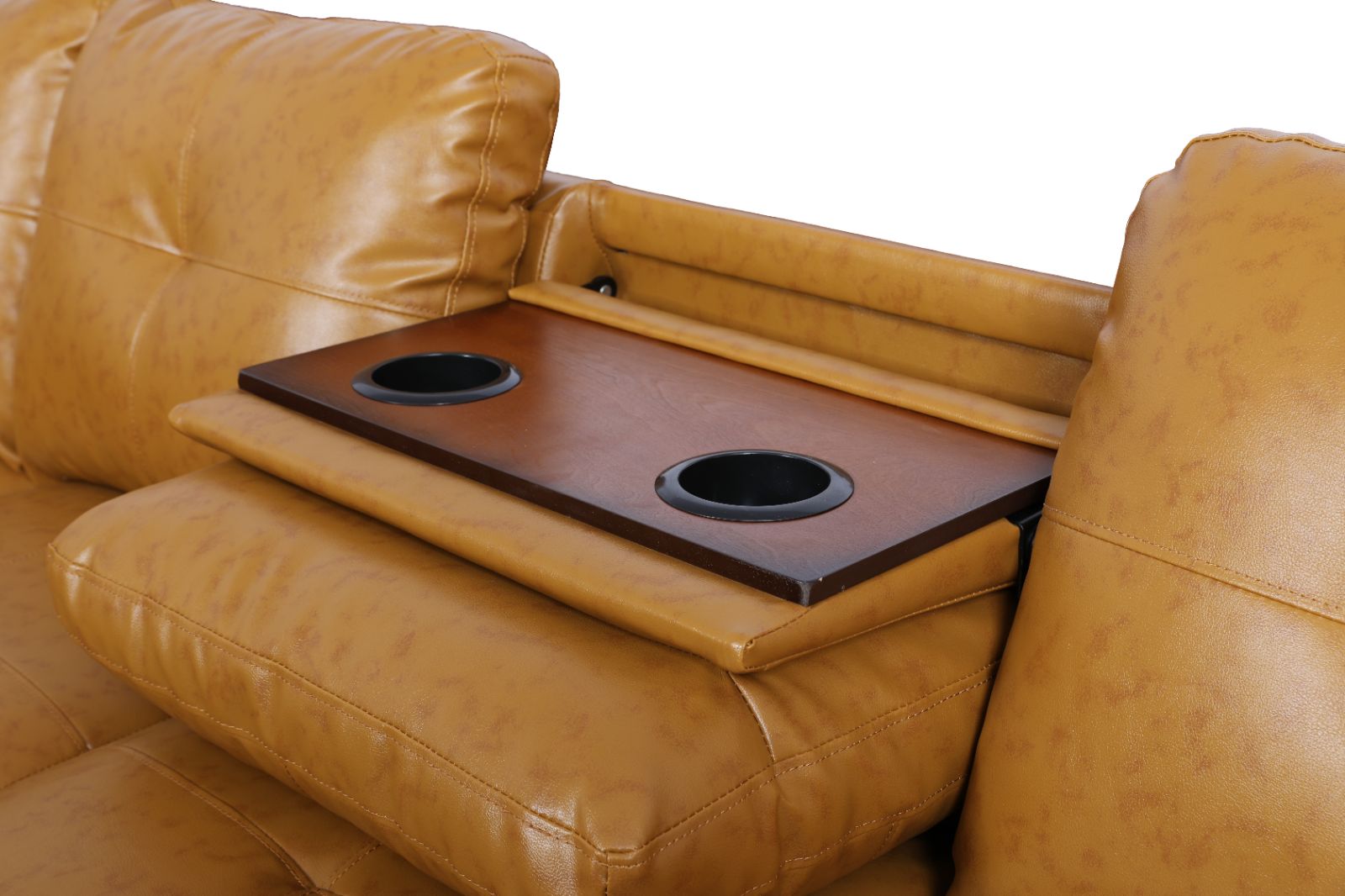 Tan leather reclining sofa with wooden tray table for media room