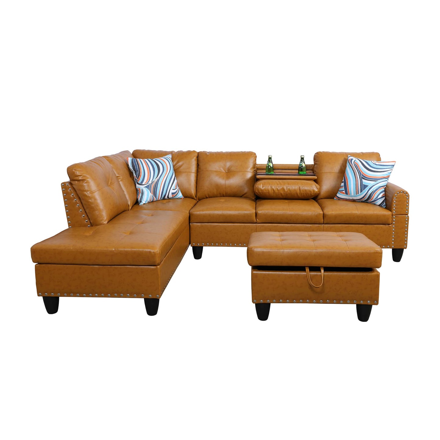 Tan brown leather sectional sofa with studded details and striped throw pillows