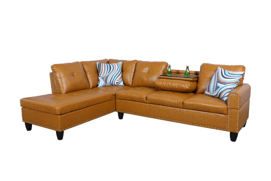 Tan leather sectional sofa with nailhead detail for living room seating