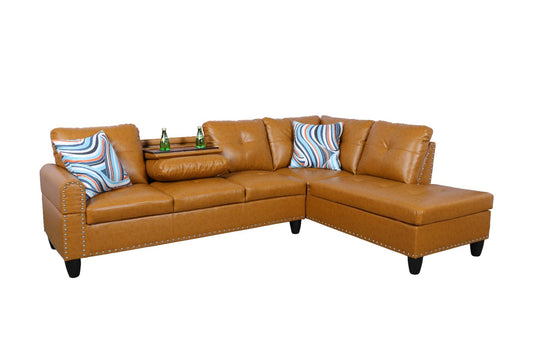 Tan leather sectional sofa with striped accent pillows for living room seating