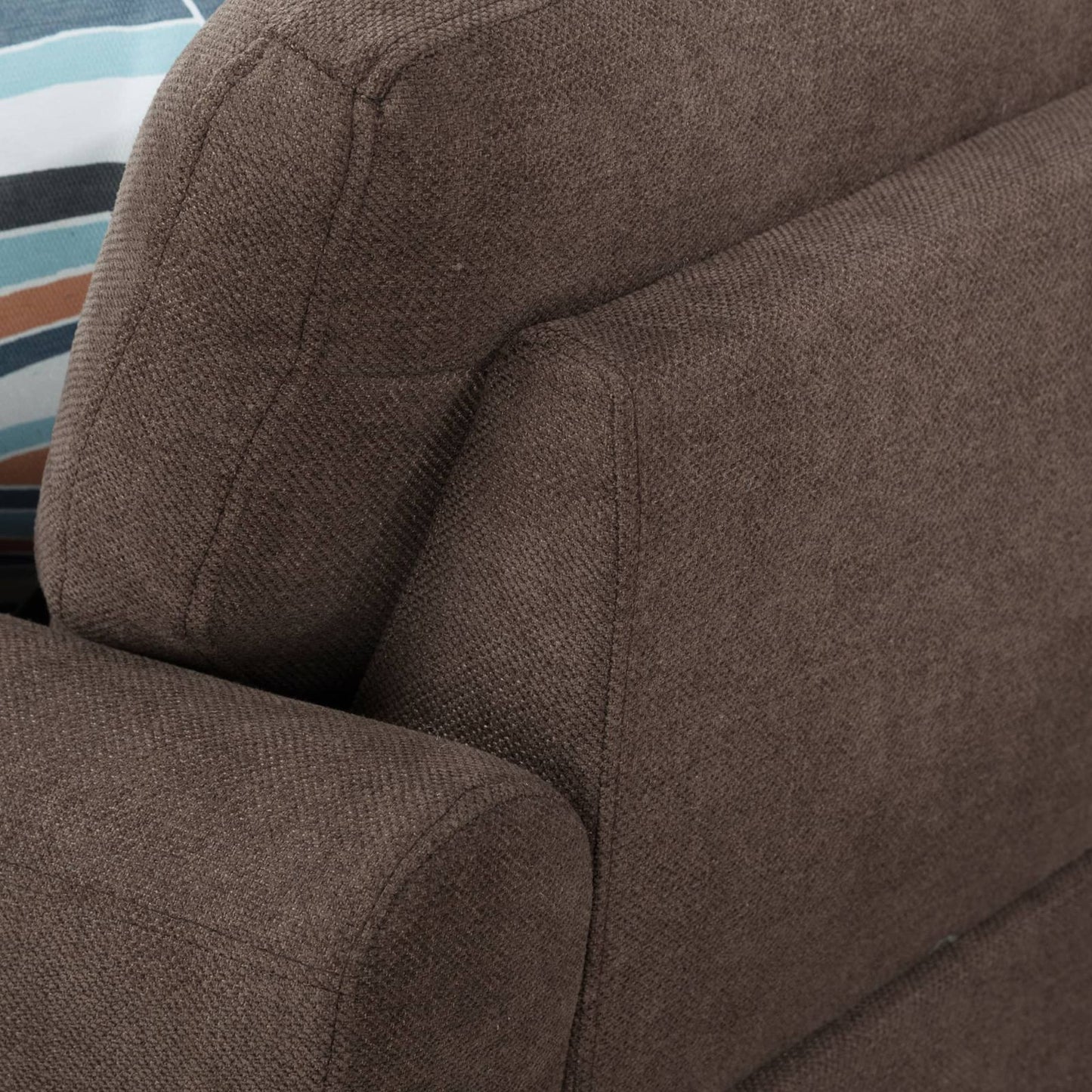 Brown fabric couch detail with stitching perfect living room furniture